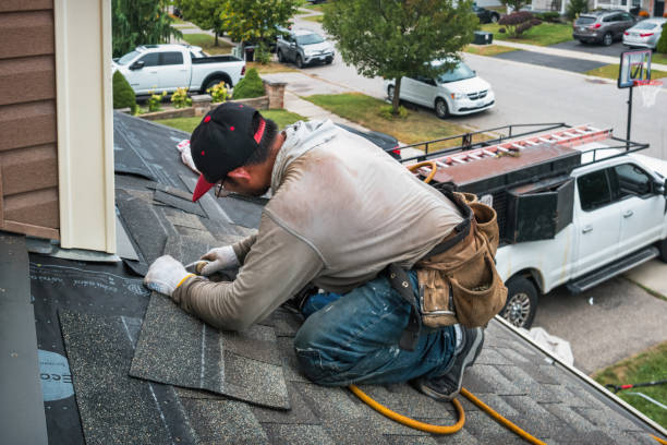 Professional Roofing technician working in Somerset, MA